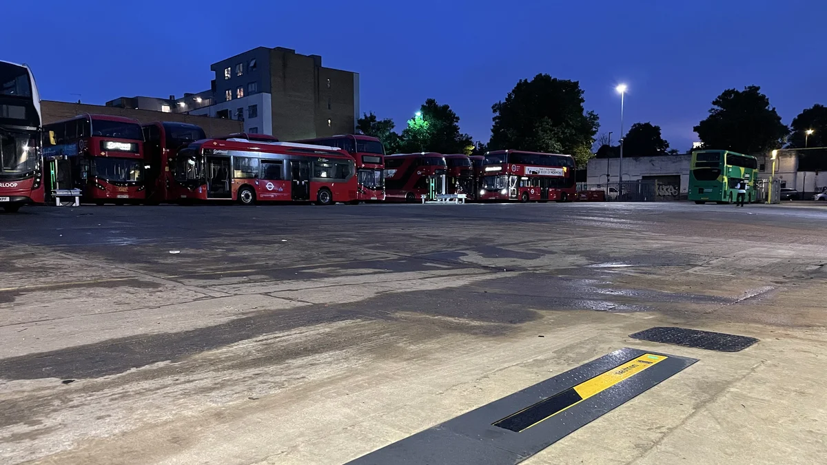 Neutron NSNF0015GRC in-ground EV charger installed flush with bus depot tarmac
