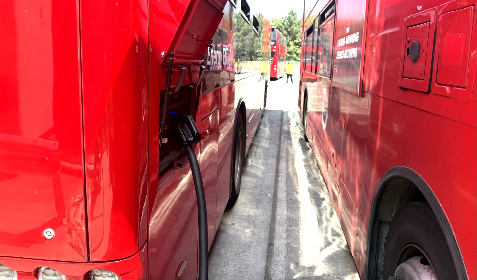 Electric bus at a UK charging depot