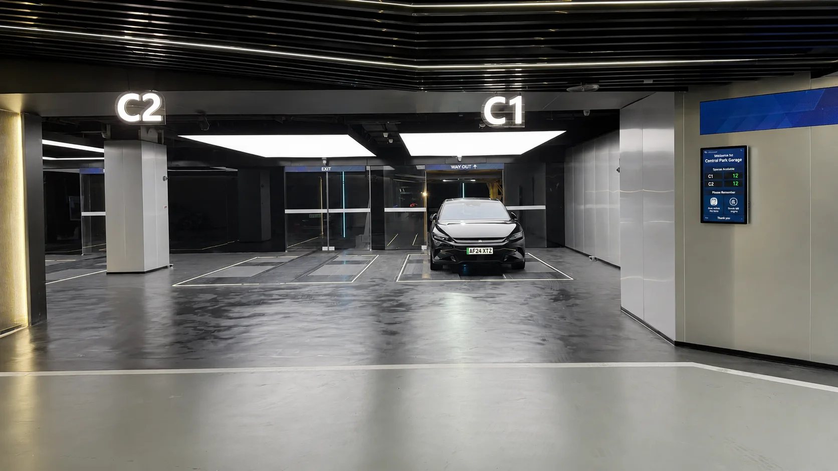 Smart Park & Charge entry bay — clean ground-level entry with automatic vehicle detection